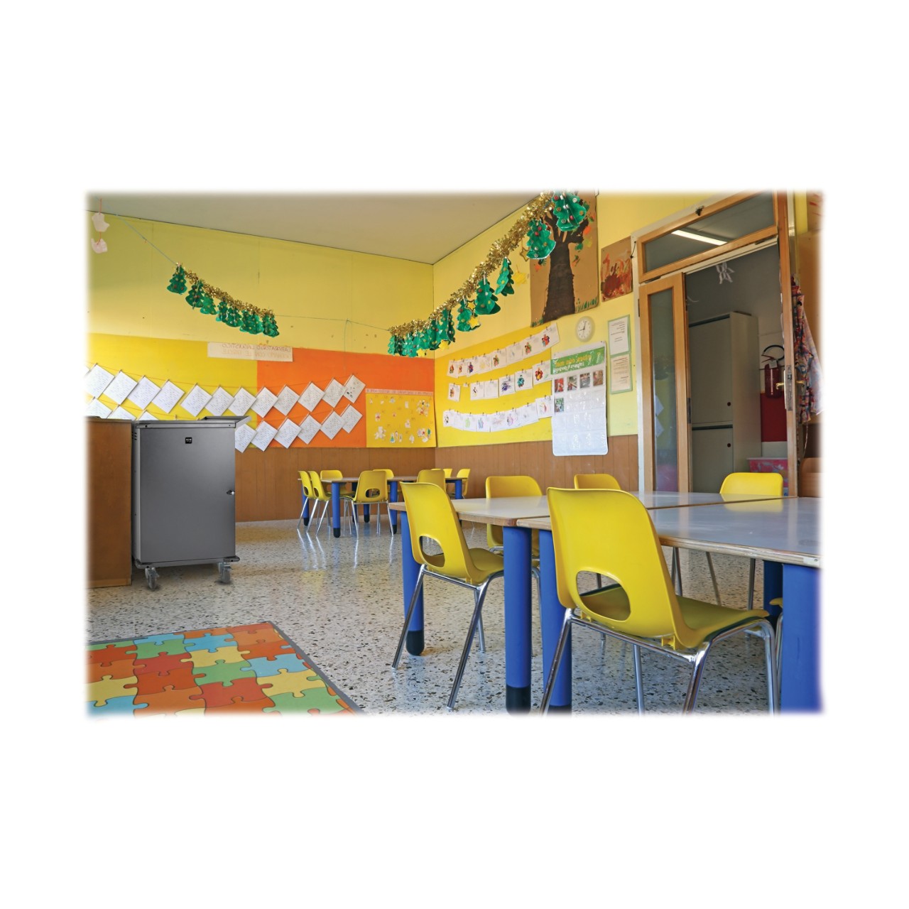 Preschool classroom with yellow chairs and table